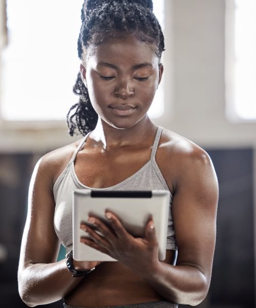 Personal trainer with digital tablet portrait, mobile technology in gym and black woman exercise in