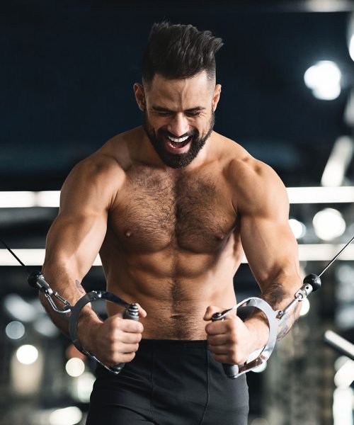 strong-muscular-man-training-with-block-exerciser-FBWYZTM - Copy